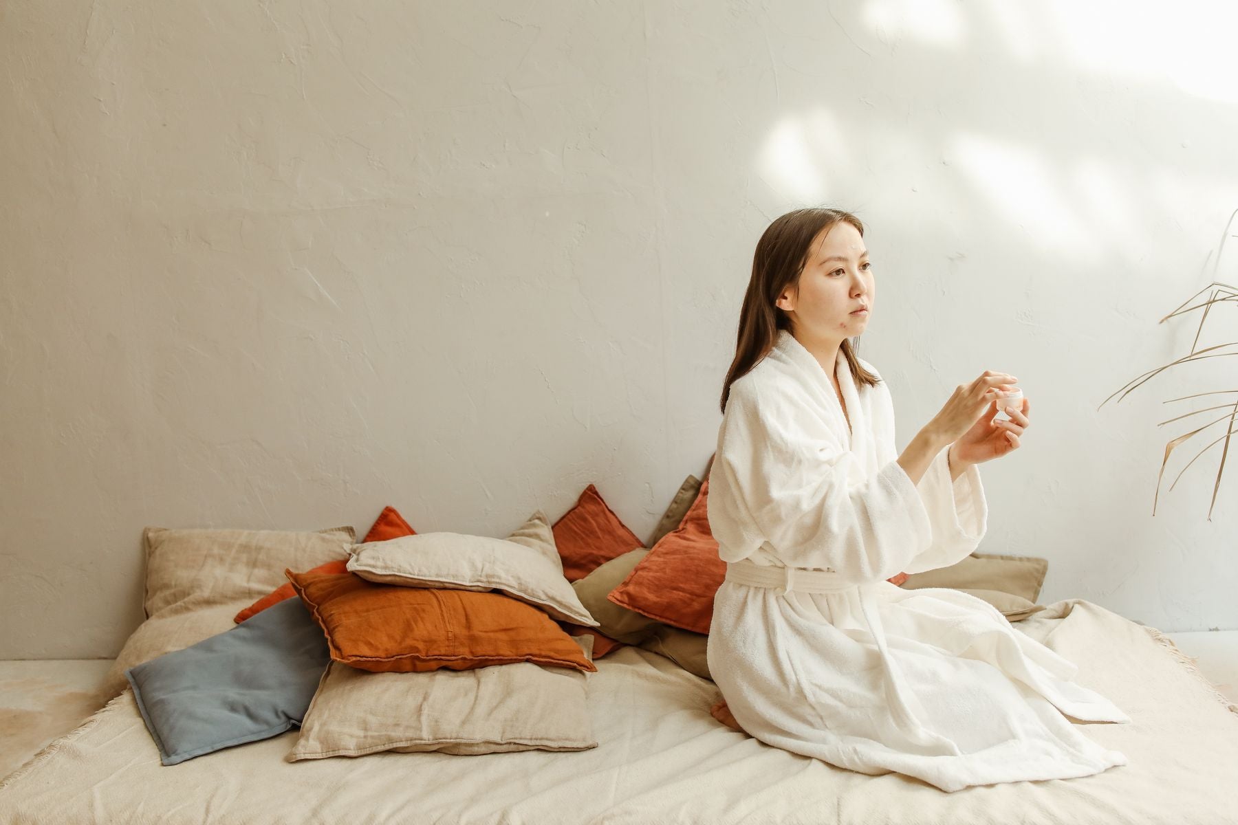 Woman enjoying a calming beauty and self-care routine